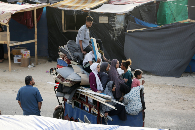 Palestinians pack up minimum goods to survive after being ordered to leave Rafah.
