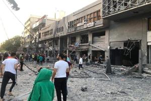 Israel fighter jets bomg Palestinian storefront in Gaza.